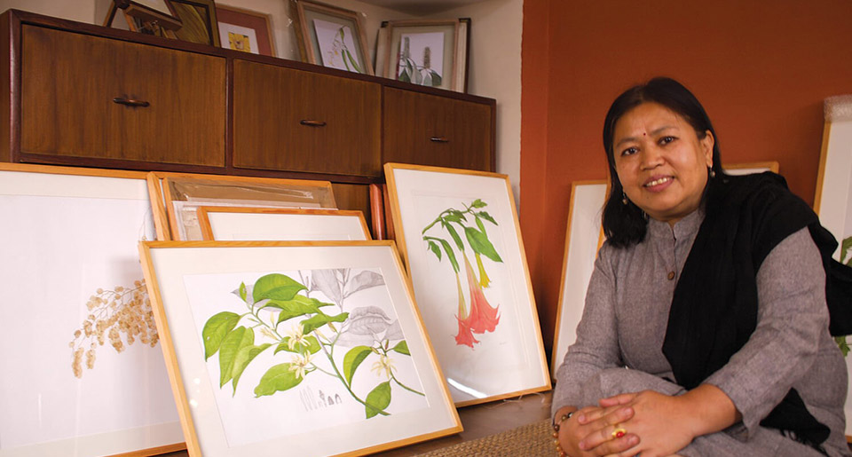 Neera with botanical paitings she amde the studio